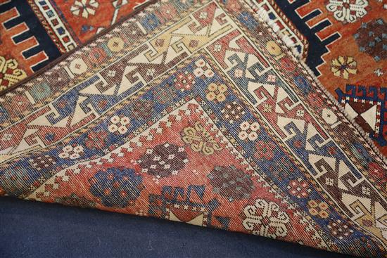 An antique Shirvan red ground rug, 6ft 9in by 4ft 5in.
